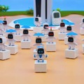 『アストロボット』がロボットトイ「toio」約50台になってダンシング！新年の挨拶を人文字（？）でも表現