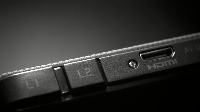 NEOGEO XのLボタンと端子部分